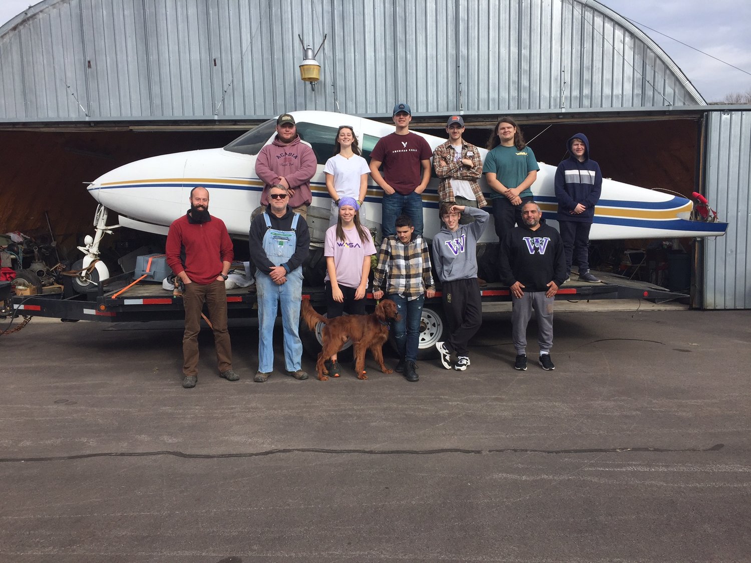 Wallenpaupack Area High School Aviation Club members with their aircraft.